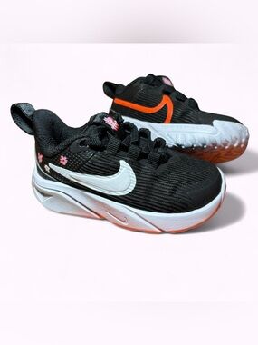 Nike Kids Star Runner Black Sneakers with White Swoosh and Pink Floral Accents
